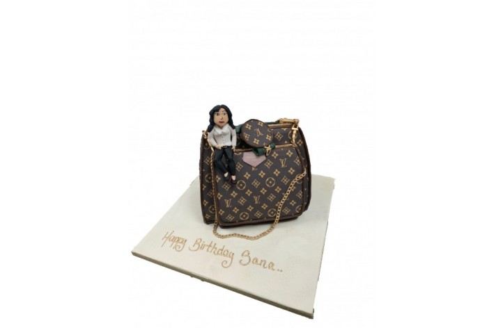 designer handbag with figure
